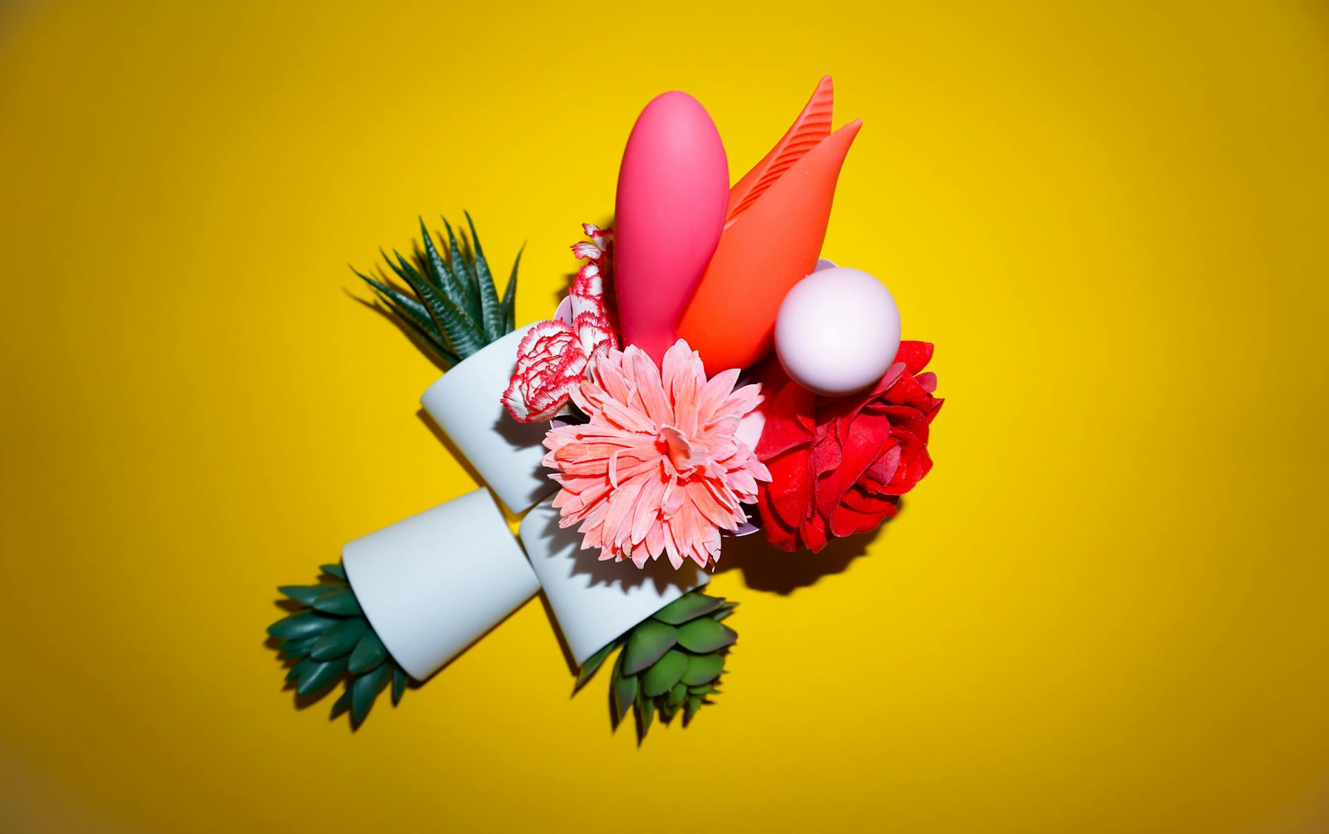 Array of vibrant clitoral vibrators and intimate toys in close-up view